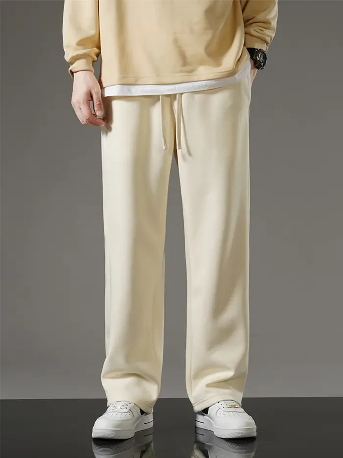Printemps automne hommes pantalons de survêtement mode coréenne vêtements de sport cordon jambe larg