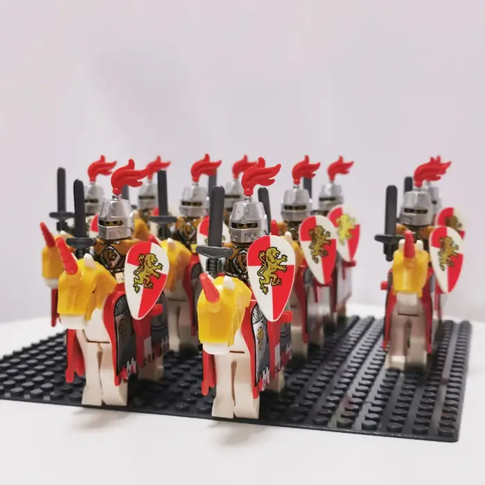 Château militaire médiéval avec soldats dragons rouges chevaliers château du roi Léon chevaux figurines briques construction blocs jouet enfant occassions spéciales anniversaire noel