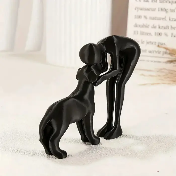 Sculpture d'art abstraite représentant un chien noir et son propriétaire pour la décoration de la maison et du bureau occasion spéciale pour les amoureux des animaux