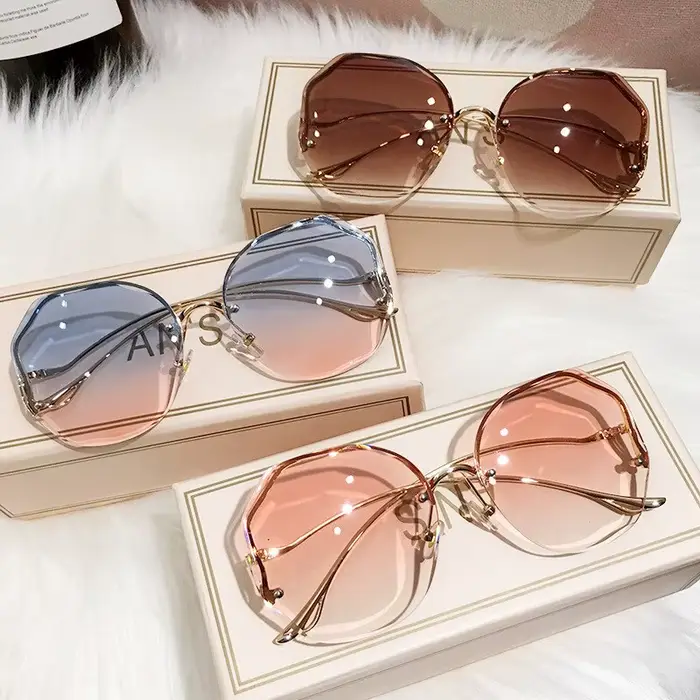 Lunettes de soleil polygonales sans monture - Style vintage féminin avec verres dégradés UV400