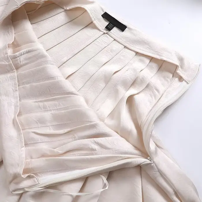 YENKYE printemps 2025 femmes Vintage taille haute côté fermeture éclair jupe plissée femme rue Beige
