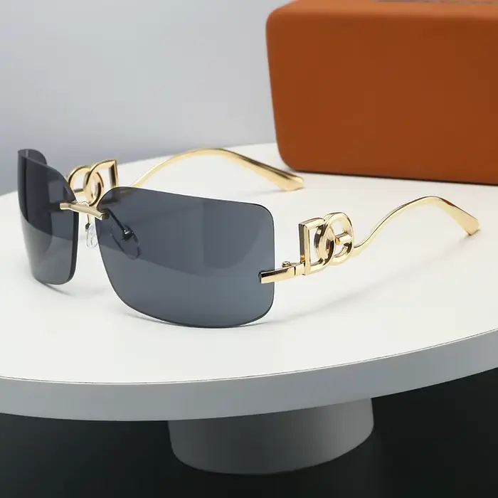 Lunettes de soleil carrées sans monture pour femmes et hommes, branches en métal doré, protection UV