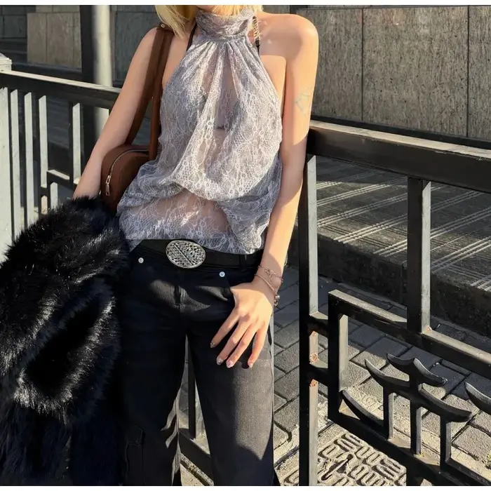Vêtements pour femmes Printemps 2026 Nouvelle mode Personnalisée Col roulé Dentelle Transparente Sans manches Dos nu Haut asymétrique