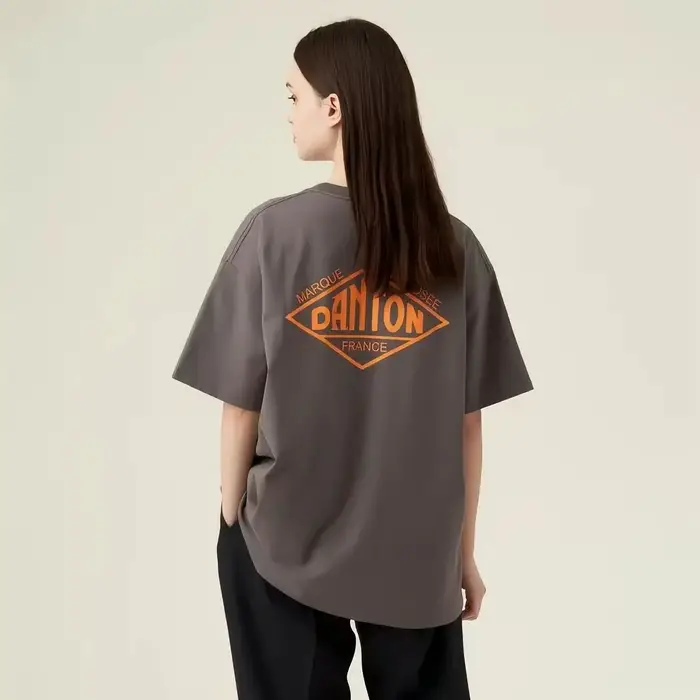 T-shirt gris à manches courtes coupe ample avec logo France imprimé et motif orange pour un style décontracté et streetwear au quotidien