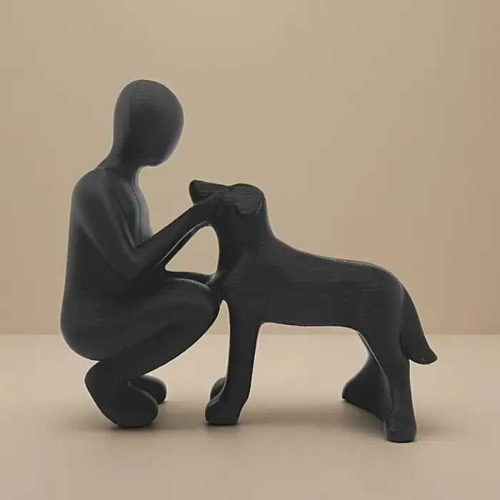Statue de l'amitié entre humains et chiens