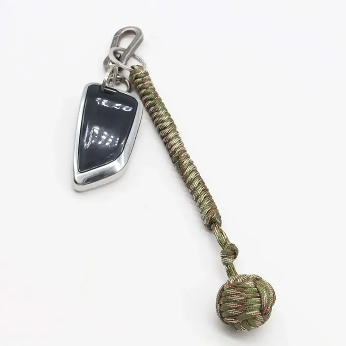 Poinçon de singe, boule en acier, lanière d'auto-défense, porte-clés de survie, fenêtre cassée, cord