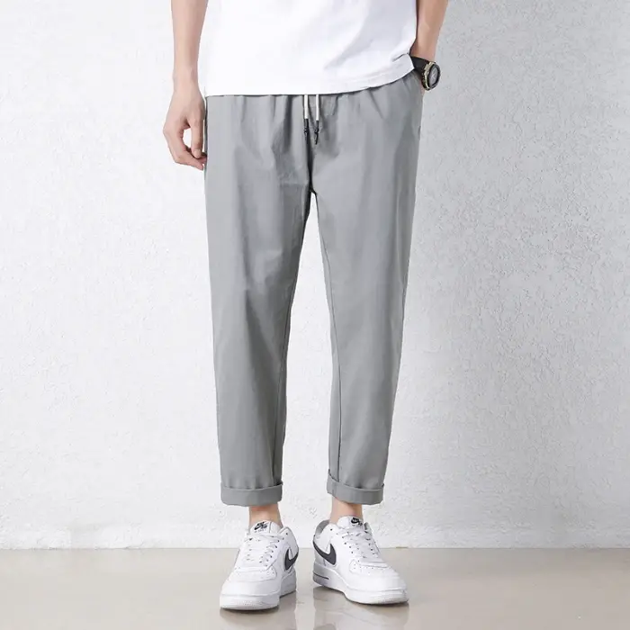 Pantalon décontracté pour homme en coton respirant, couleur unie gris kaki, idéal pour le printemps 