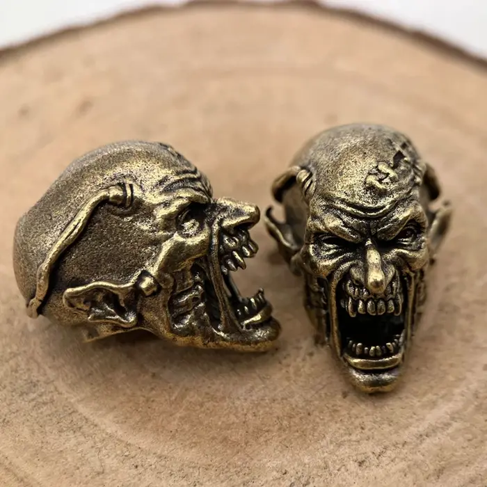 Perles de couteau en laiton motif crâne zombie pendentifs tressés faits main en paracorde accessoires pour randonneurs et amateurs de films d'horreur occasions spéciales